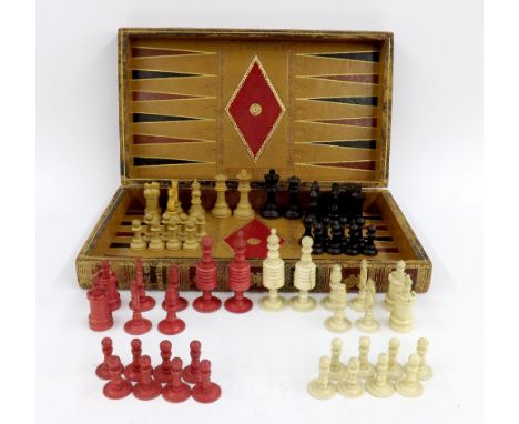 19th century bone chess set, height of king 10.5cm; together with a boxwood Staunton chess set, height of king 8cm and a leat