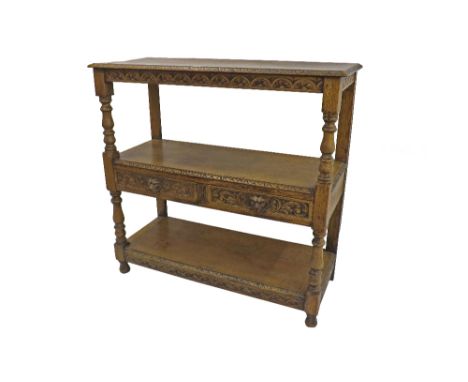 Flemish style 19th century oak three tier buffet, with typical scratch carvings and baluster supports, the second shelf fitte