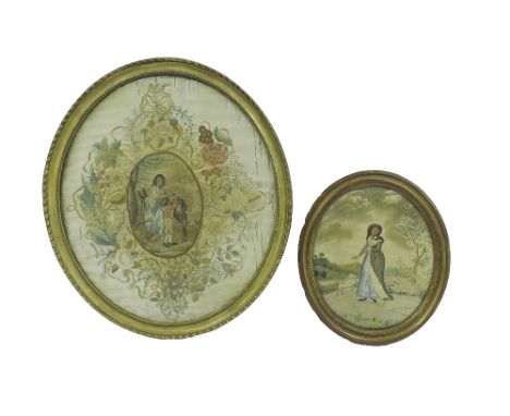19th century silkwork oval study, centrally decorated with a panel of a young girl and boy loading a donkey within a scrolled