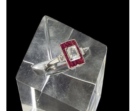 Good Art Deco style 18ct white ruby and diamond dress ring, rectangular setting with an emerald-cut central diamond, 0.45ct a