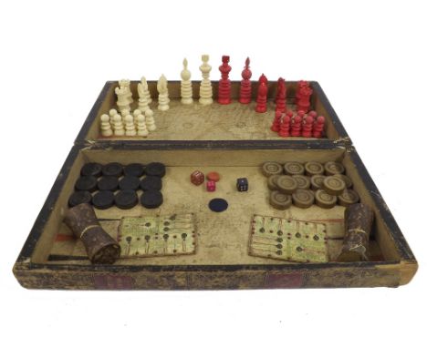 19th century ivory chess set, height of king 9.6cm, within a tooled leather backgammon board with various shakers and counter