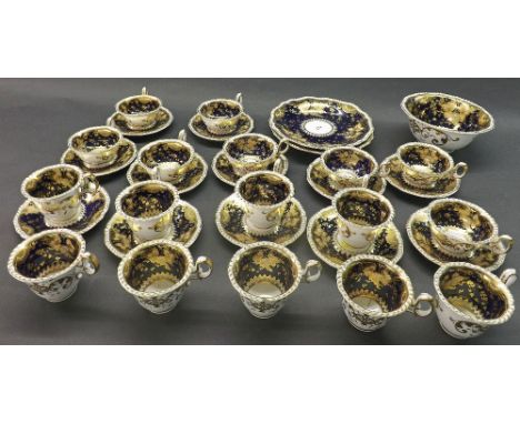 H & R Daniel porcelain part tea service, pattern 4150, comprising two plates, nine cups, eight breakfast cups and twelve sauc