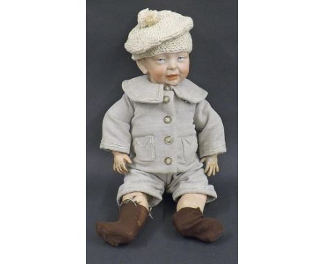 Kammer & Reinhardt bisque headed toddler doll with fixed eyes, painted hair, herringbone day suit and wooden articulated limb