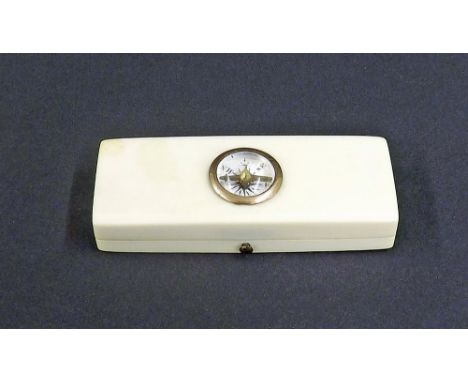 Early 19th century ivory toothpick holder, the lid applied with a gold framed compass enclosing an interior fitted with a mir