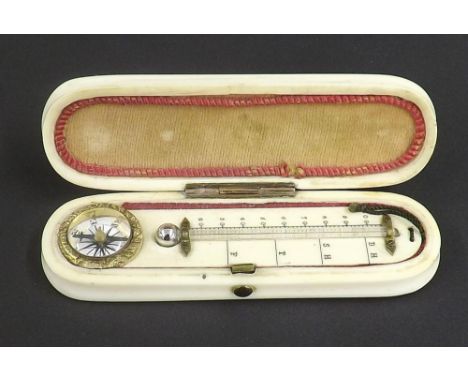 Antique ivory and gold pique work oval box, the hinged lid enclosing a compass and thermometer, 3.5" long