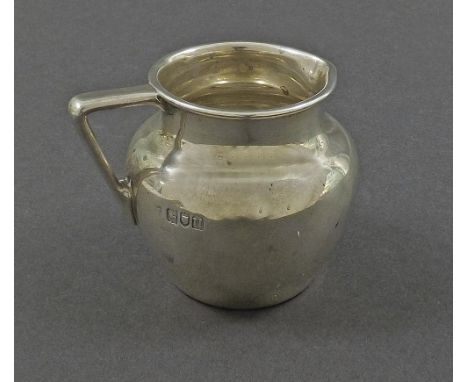 Early 20th century silver ovoid cream jug with cast angular handle, maker R & W Sorley, London 1915, 3" high, 5.5oz approx
