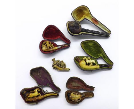 Four cased carved Meerschaum pipes, novelty carved owl pipe and a Lowe & Co novelty pipe in the form of a duck's head