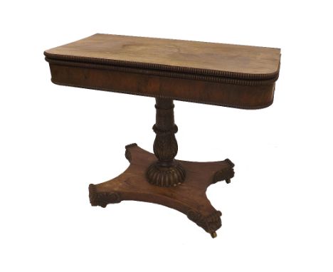 William IV rosewood foldover card table, the D-end top with gadrooned mouldings upon an acanthus turned column with quatrefoi