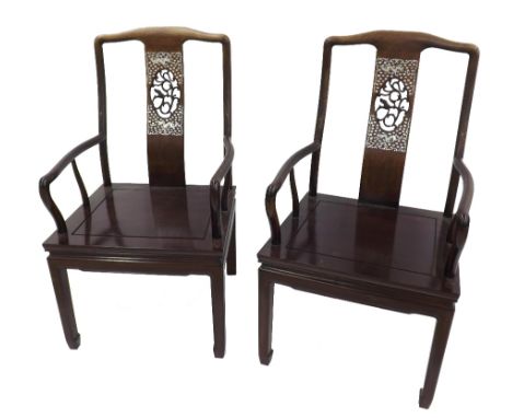 Pair of Chinese hardwood carver chairs, the vertical curved splats with scrolled foliage framed by mother of pearl inlay depi