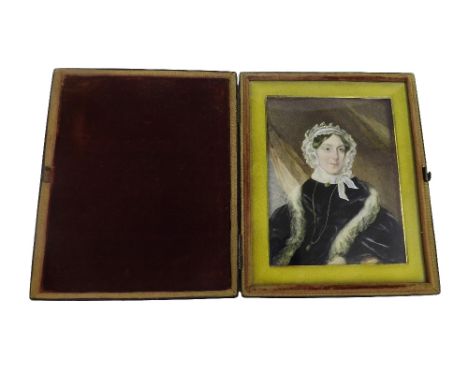 English School - half length portrait of an older lady in a bonnet and fur stole, work on ivory, within a Moroccan leather ca