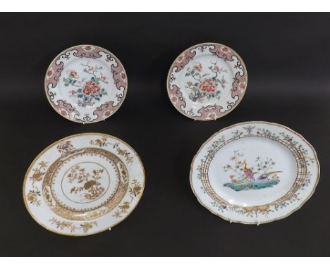 Pair of 18th century Chinese porcelain plates, polychrome with flowers within scroll pink diaper borders, 8.75" diameter; tog