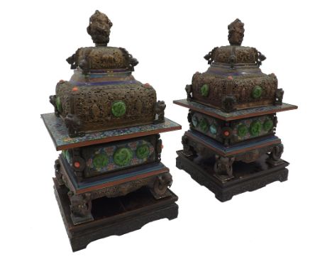 Interesting pair of late 19th/early 20th century Tibetan incense burners, with pierced and embossed copper lid decorated with