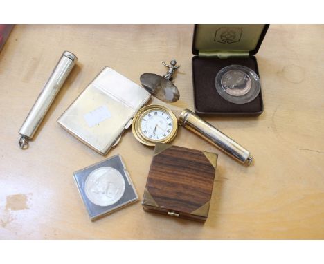 Collectable items to include a silver cigarette case, two cheroot holders, Asprey alarm clock and a coin