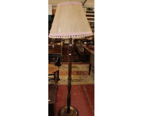 A standard lamp and commode