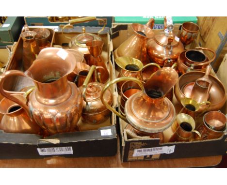 Two boxes of miscellaneous copperware, to include Regency style planter of rectangular form with lion mask handles and on paw