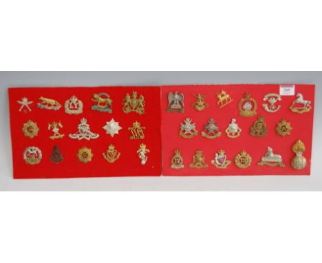 A collection of assorted military cap badges, to include Royal Artillery, Derbyshire Regiment, Notts &amp; Derbyshire, Royal 