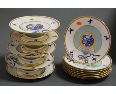 A Victorian Minton part dessert service, the central panel blue and white decorated in the Chinese style, within gilt borders