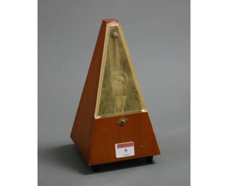 A 1960s French walnut metronome