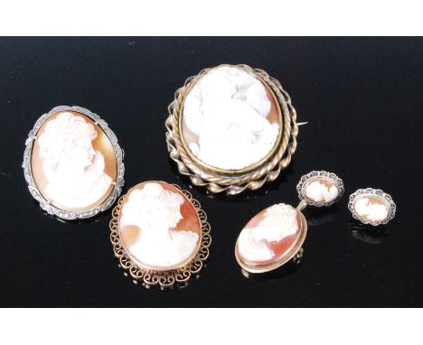 A Victorian carved shell cameo brooch as a winged angel in pinchbeck surround (a/f); one other later example depicting profil