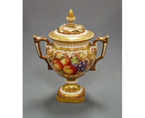 A circa 1960s Royal Worcester pot pourri, the pierced cover with gilt finial, the body with twin handles, hand-painted with a