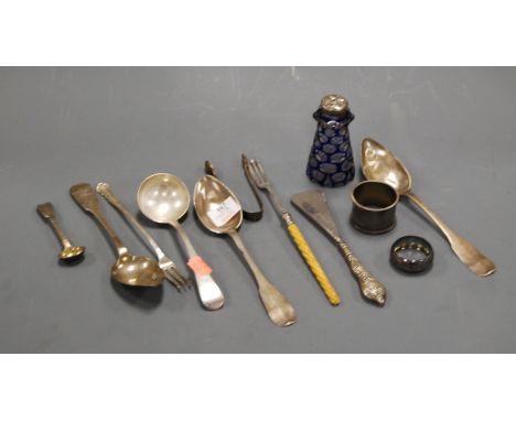 A late Victorian blue overlaid glass sifter, with silver mount; together with a silver napkin ring and loose flatware etc