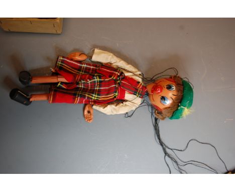 An original Pelham Puppet, boxed, Scottish Puppet. MacBoozle printed on the box.Box is intact but tired and showing wear.Some