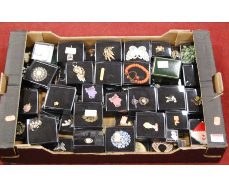 A large collection of costume jewellery, lapel badges etc to include British Women section British Legion drop pendant brooch