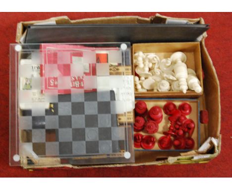 A 19th century natural and red stained ivory chess set, height of king 11.5cm (complete but with break to one white knight an