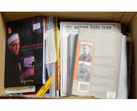 A box of assorted cinematic books and magazines, to include Tony Peak Derek Jarman, The Python's Autobiography by The Python'