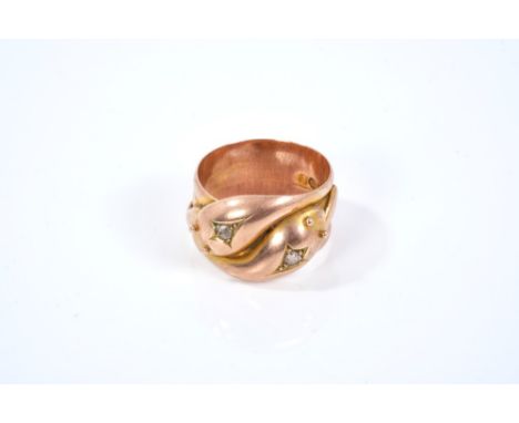 9ct rose gold double snake ring, the entwined heads each set with a single stone rose cut diamond. Ring size R/SCondition rep