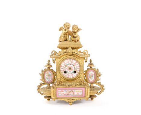 19th century French gilt metal and porcelain panel inset mantel clock with cherub mounts and painted decoration, eight day Fr