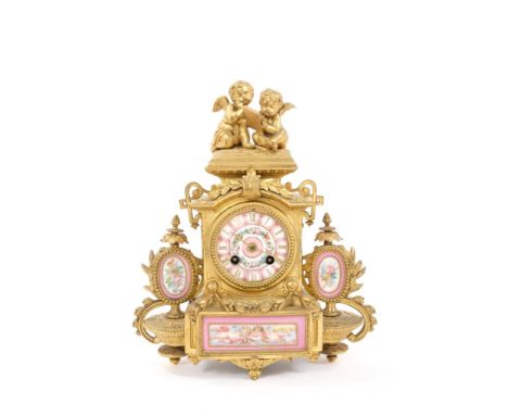 19th century French gilt metal and porcelain panel inset mantel clock with cherub mounts and painted decoration, eight day Fr