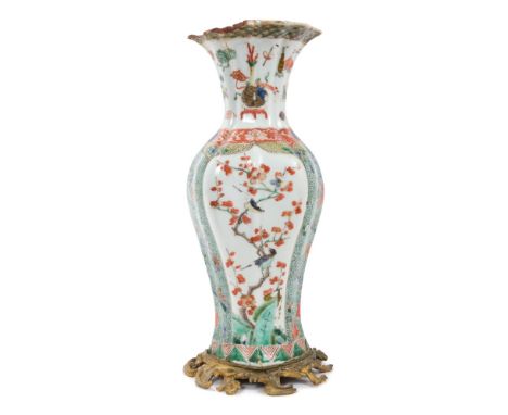 Early 18th century Chinese famille verte vase with painted birds, insects and trees with ormolu scroll mount, 29.5cm height