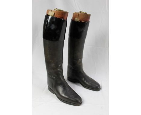 Pair black leather hunting boots with black patent tops and Maxwell, London wooden trees, approximately size 8-9