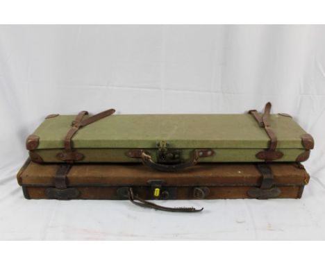 James Purdey &amp; Sons canvas covered gun case with leather mounts and straps, 83cm long overall, together with another simi