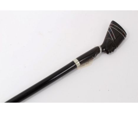 Unusual early 20th century walking stick with ebonised shaft and horn handle carved in the form of an Egyptian Pharaoh's head