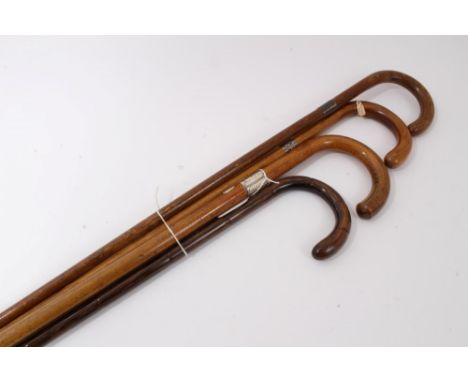 Victorian Malacca walking stick, with crook handle and silver collar (Birmingham 1894) together with another similar cane sti