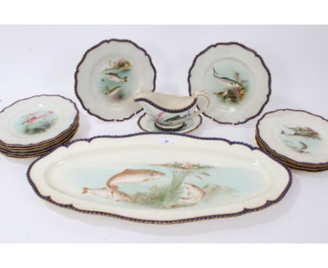 Late Victorian Royal Worcester porcelain fish service, each piece with overpainted transfer decoration depicting various fish
