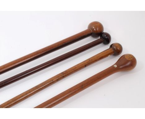 Tall exotic wood walking stick with rondel handle 109cm overall length together with three others 87cm to 90cm overall length