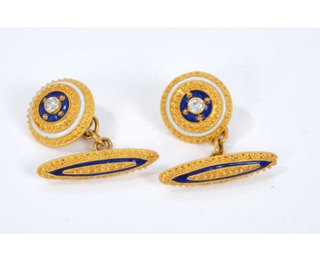 Pair French gold diamond and enamel cufflinks, each set with a central brilliant cut diamond, surrounded by blue and white en
