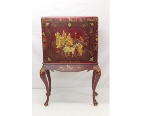 1920s Chinoiserie secretaire cabinet on stand, red lacquered, with fall front finely decorated with figural scene, enclosing 