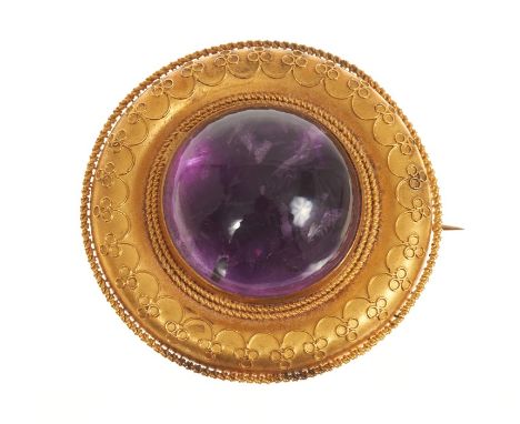 Etruscan Revival gold and amethyst cabochon target brooch with applied gold wire work decoration, diameter 40mmCondition repo