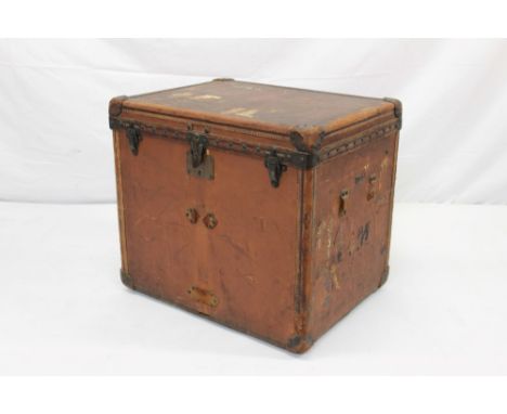 Vintage Louis Vuitton leather bound travelling trunk, square form, enclosing cloth lined tray and lined interior with Louis V