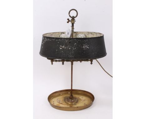 Rare early 20th century student lamp, having tin shade and four lights adjusting on a column, oval tray base, 55cm high