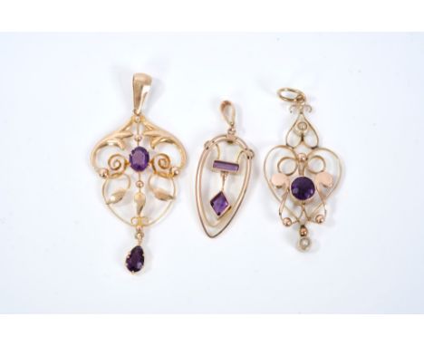 Three Edwardian Art Nouveau gold and amethyst pendants