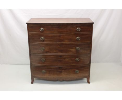 Regency mahogany bowfront chest of drawers, with reeded ebony frieze and five long graduated drawers on splayed bracket feet,