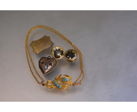 An Edwardian yellow metal heart locket set two garnets and an oval opal cabouchon (l. 2cm), a yellow metal turquoise mounted 