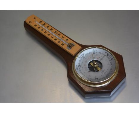 An S.B. compensated mahogany wall mounted barometer, complete with thermometer (l.31cm x 13cm)