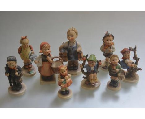A collection of nine various Hummel pottery figures including Chimney Sweep Boy, the Little Gardener, Off to School, Appletre