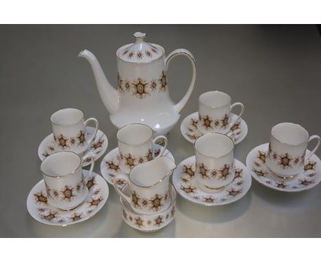 A Paragon china Flamenco pattern coffee service of fifteen pieces, with stylised enamel design, with gilt borders (coffee pot